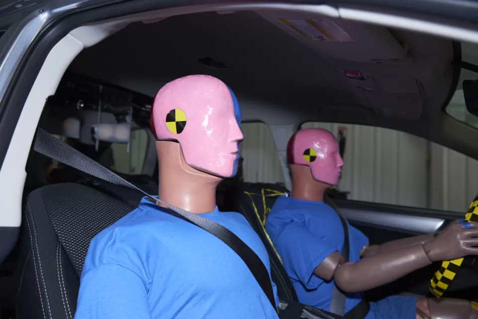 Crash test dummies in a car